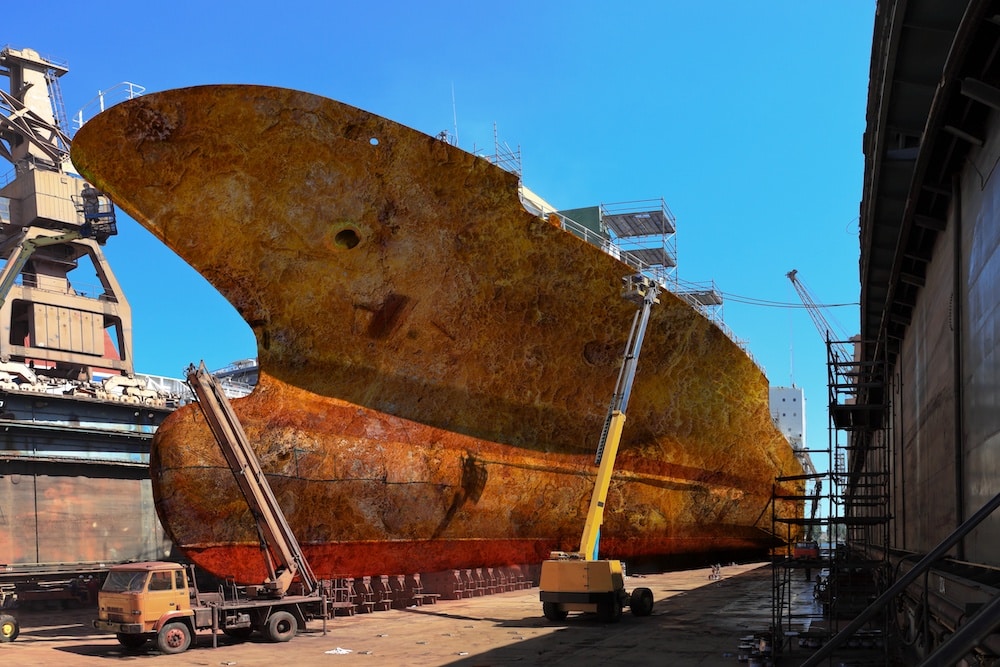 Ship hull with severe corrosion — why cathodic protection and sacrificial anodes are essential